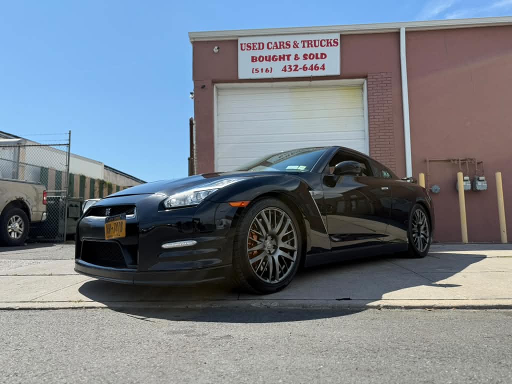 Nissan GT-R: R35 sitting clean out front of the shop.